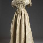 fringe-trimmed wedding gown  ~  1859