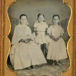 three well-dressed girls ~ 1850s