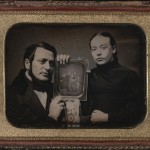 Man & Woman with Family Portrait, ca. 1850