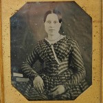 Young woman in Plaid Dress, 1840s