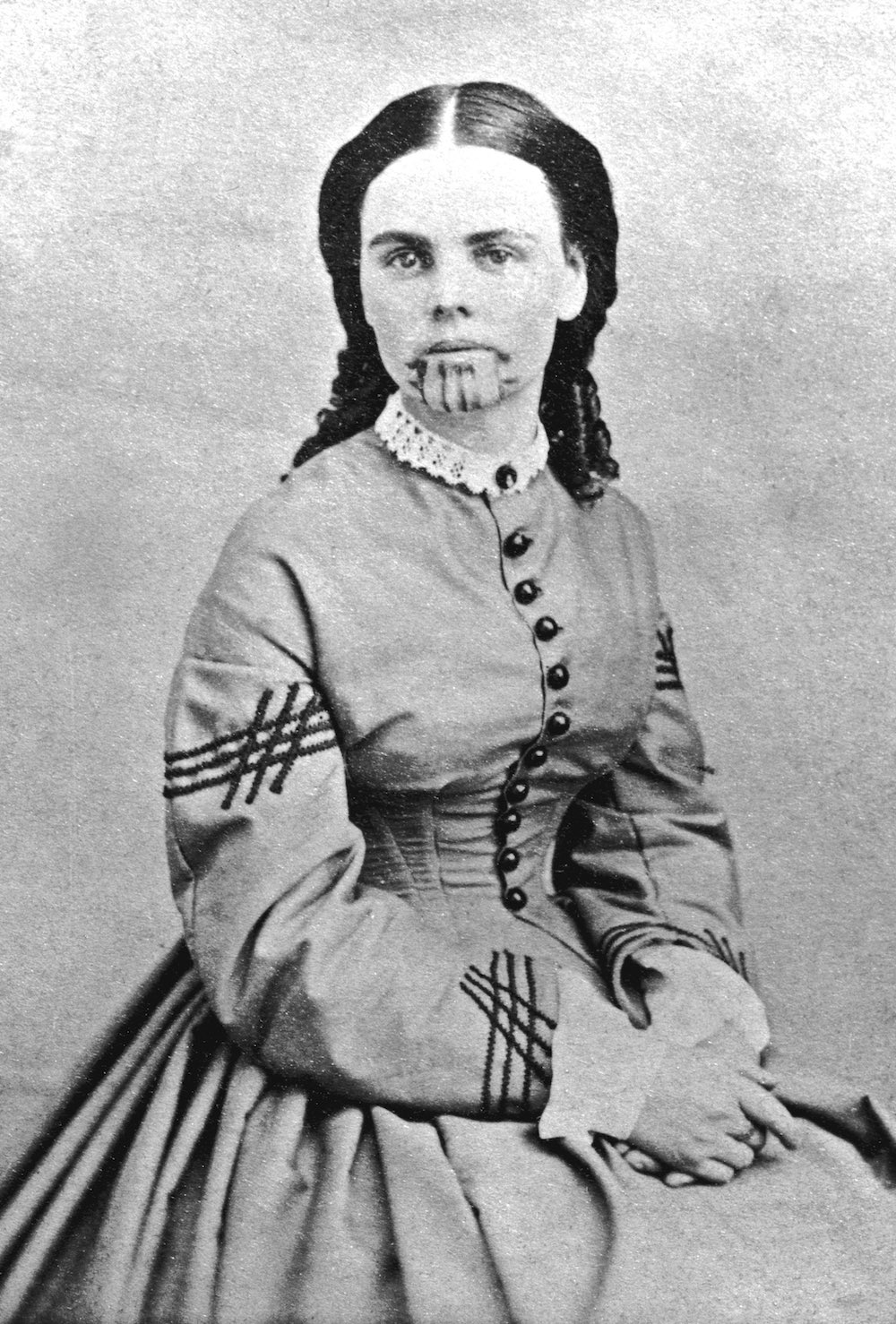 1800s girl with tattooed face