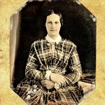 Lady in plaid dress with Iroquois beaded bag, 1840s