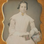 Lady holding Daguerreotype case, 1840s