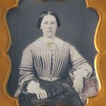 Woman in yoked wool dress, ca. 1860s