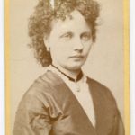 Lady with curly coiffure, 1872