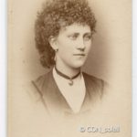 Curly Coiffure, 1873