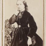 Lady with fringe trimmed sleeves, 1860s