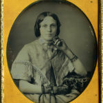 Lady with lace gloves, 1840s