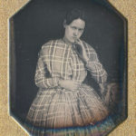 Lady in plaid dress, 1840s