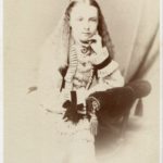Girl with loose hair, ca. 1870s