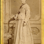 Lady in checkered dress, ca. 1880s