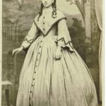 Young woman with zig zag trimmed sleeves, ca. 1860s