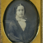 Lady with pendant earrings, ca. 1850s