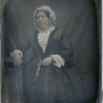 Lady with deep vee bodice, 1850s
