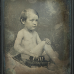 Boy with music box (Johannes Krone?), ca. 1855-59